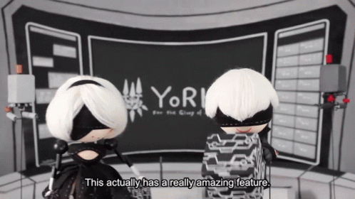 A Video Game Character Says " This Actually Has A Really Amazing Feature " In Front Of A Large Screen GIF