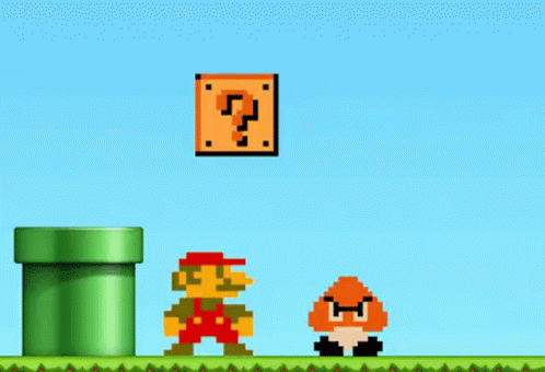 A Video Game Character With A Question Mark On His Chest GIF