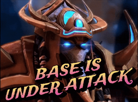 A Video Game Character With The Words Base Is Under Attack On The Bottom GIF
