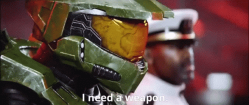 A Video Game Character With The Words I Need A Weapon GIF