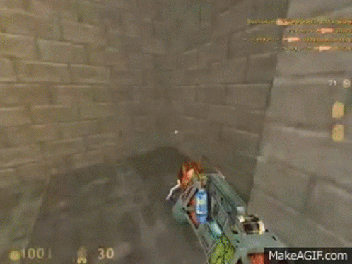 A Video Game Is Being Played On A Computer And A Person Is Holding A Gun . GIF