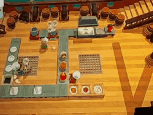 A Video Game Is Being Played On A Wooden Table GIF