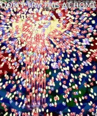 A Video Game Screen With A Bunch Of Fireworks And The Words `` Do N't Try This At Home '' GIF