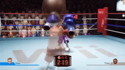 A Video Game Shows A Boxing Match Between Mike And Theo And The Time Is 2:19 GIF