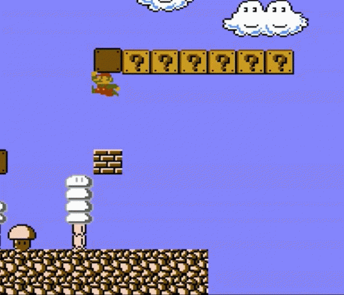 A Video Game With A Brick With A Question Mark Above It GIF
