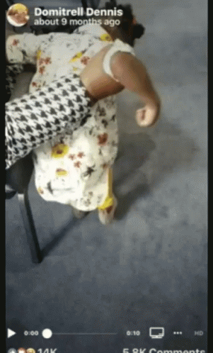 A Video Of A Baby Being Spanked By A Man Named Domitrelli Dennis GIF