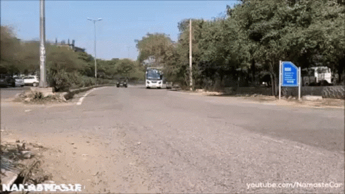 A Video Of A Bus Driving Down A Road With A Youtube Link GIF