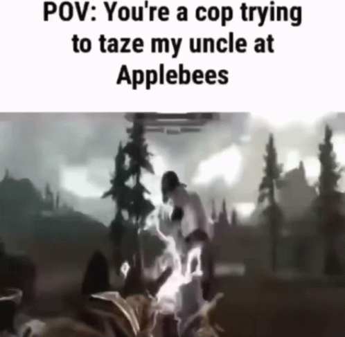 A Video Of A Cop Trying To Taze An Uncle At Applebees . GIF