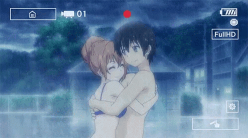 A Video Of A Man And A Woman Hugging Is Being Recorded At Full Hd GIF