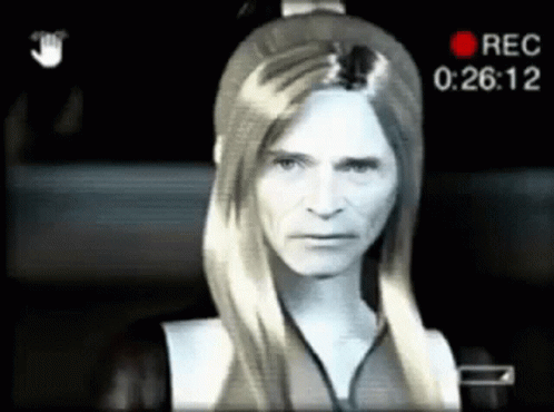 A Video Of A Man With Long Hair Is Being Recorded At 0 : 26 : 12 GIF