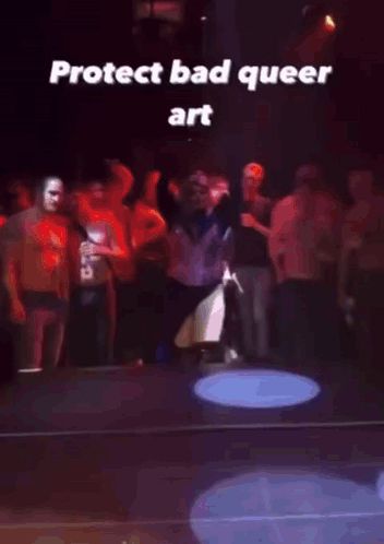 A Video Of A Person Dancing With The Words Protect Bad Queer Art GIF