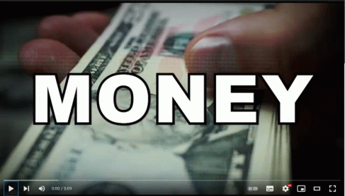 A Video Of A Person Holding A Stack Of Money GIF