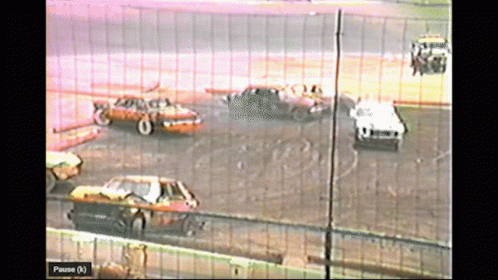A Video Of A Race With A Pause Button GIF