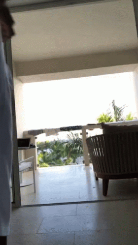 Balcony View With Chair And Laptop GIF