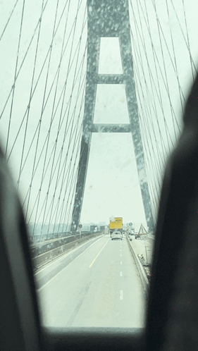 A View Of A Bridge From A Car Window GIF