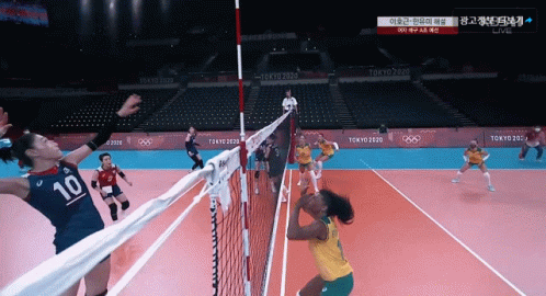 A Volleyball Player With The Number 10 On Her Jersey GIF