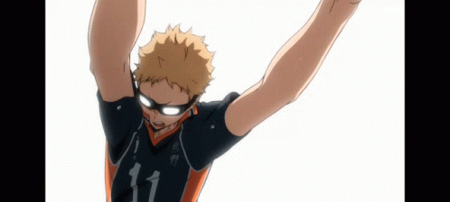 A Volleyball Player With The Number 11 On His Jersey Is Jumping In The Air With His Arms In The Air . GIF