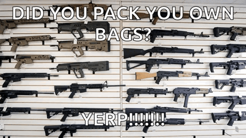A Wall Full Of Guns With The Words " Did You Pack You Own Bags " GIF