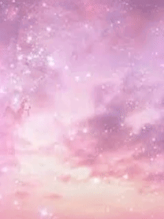 A Wand With A Crescent Moon On It Against A Pink Sky GIF