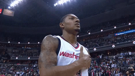 A Washington Wizards Player Giving A Thumbs Up In Front Of A Crowd GIF