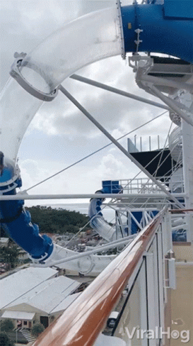A Water Slide On A Cruise Ship That Says Viralhog On It GIF