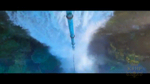 A Waterfall Is Surrounded By Mountains And Trees And A Blue Pipe Is Hanging Over It . GIF