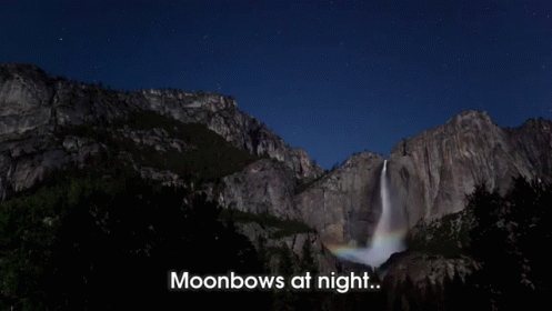 A Waterfall With The Words Moonbows At Night GIF