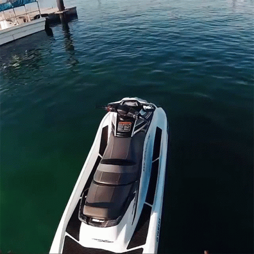 A White And Black Jet Ski With The Word Yamaha On It GIF