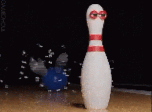 A White Bowling Pin With Red Stripes And Glasses On It GIF