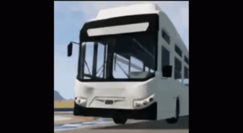 A White Bus Is Driving Down A Road GIF