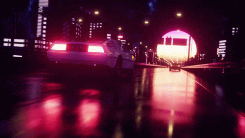A White Car Is Driving Through A Tunnel With A Sunset In The Background GIF