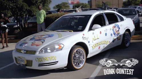 A White Car With A License Plate That Says ' Crunchy ' On It GIF