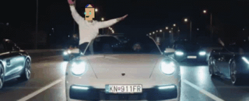 A White Car With A License Plate That Says Kn 911Fr GIF