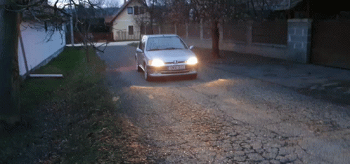 A White Car With A License Plate That Says Nct-779 GIF