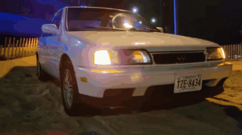 A White Car With A Virginia License Plate Tze-8434 GIF