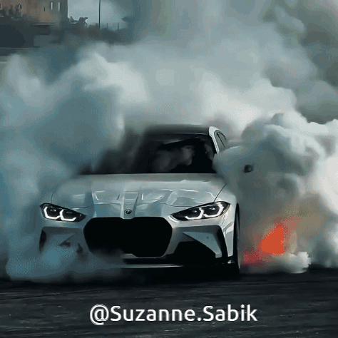 A White Car With Smoke Coming Out Of It And The Words @Suzanne.sabik On The Bottom GIF