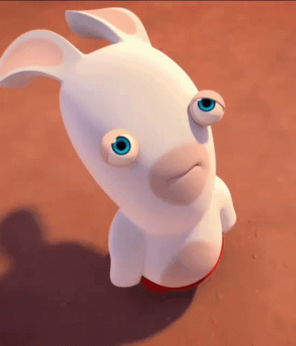 A White Cartoon Rabbit With Blue Eyes Looks Up At The Camera GIF