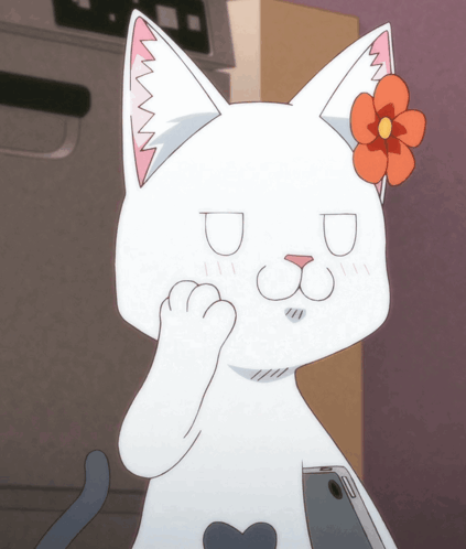 A White Cat With A Flower In Its Ear Is Holding A Phone GIF