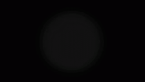 A White Circle Is Surrounded By A Gray Circle On A Black Background GIF