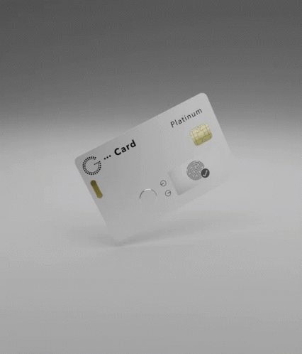 A White Credit Card With A Black Stripe That Says Nfc On It GIF