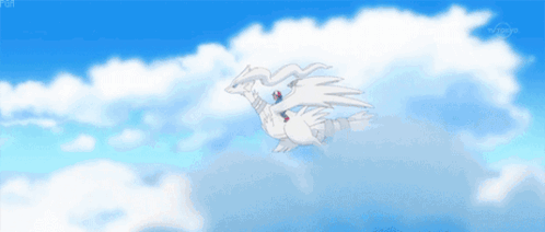 A White Dragon Is Flying Through The Clouds In A Blue Sky GIF