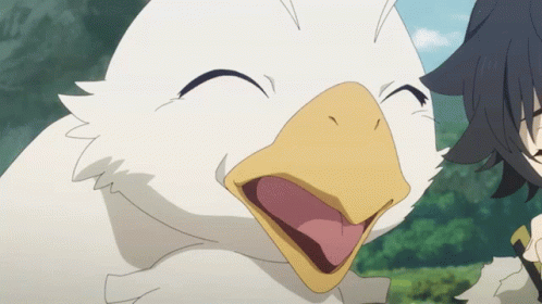 A White Duck With A Yellow Beak Is Smiling With Its Mouth Open GIF