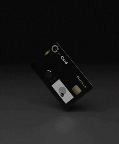 A White G Card Platinum Card Is Laying On Its Side GIF