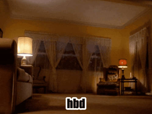 A White Horse Is Standing In A Living Room With A Hbd Sticker GIF