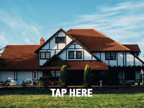 A White House With A Red Tile Roof And The Words Tap Here Below It GIF