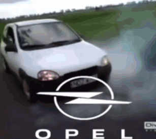 A White Opel Car Is Driving On A Wet Road GIF