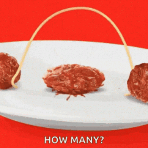 a white plate with spaghetti and meatballs on it with the words how many written on the bottom