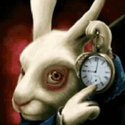 A White Rabbit Is Holding A Pocket Watch And Pointing At The Time GIF