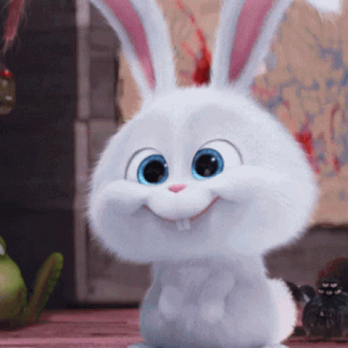 a white rabbit with blue eyes is smiling and looking at the camera .