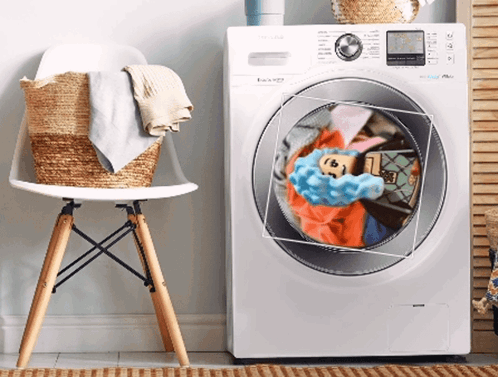 A White Samsung Washing Machine With Clothes Inside GIF